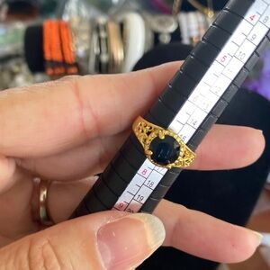 Elegant Gold Ring with Black Gem